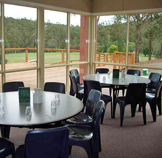 Dining settings looking out over grassy surrounds