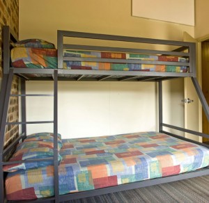 Bunk Beds with geometric patterned bed sheeting